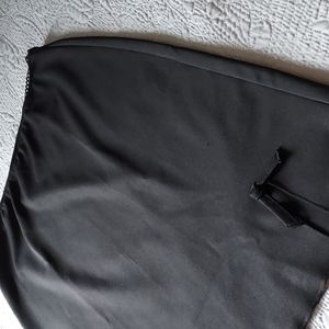 Large black medium-length skirt